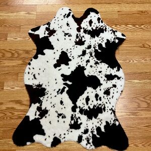 Cow print rug